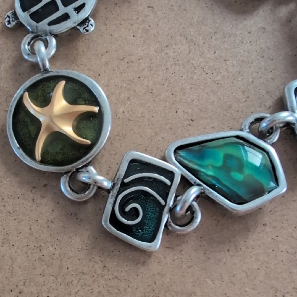 Artisan Silver and Gold Charm Bracelet